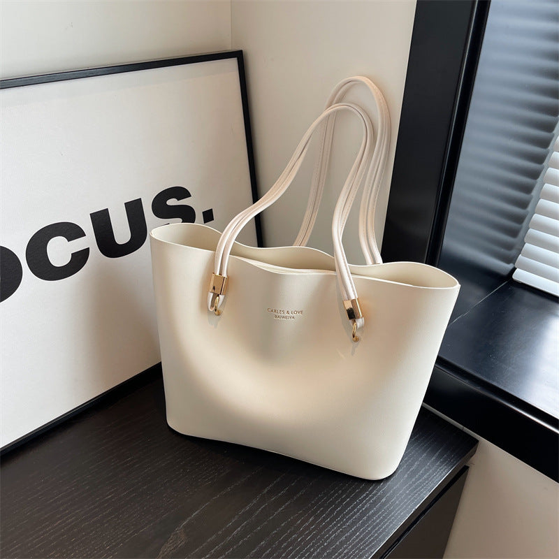 Tyylikäs ja ajaton käsilaukku – täydellinen arkeen ja juhlaan