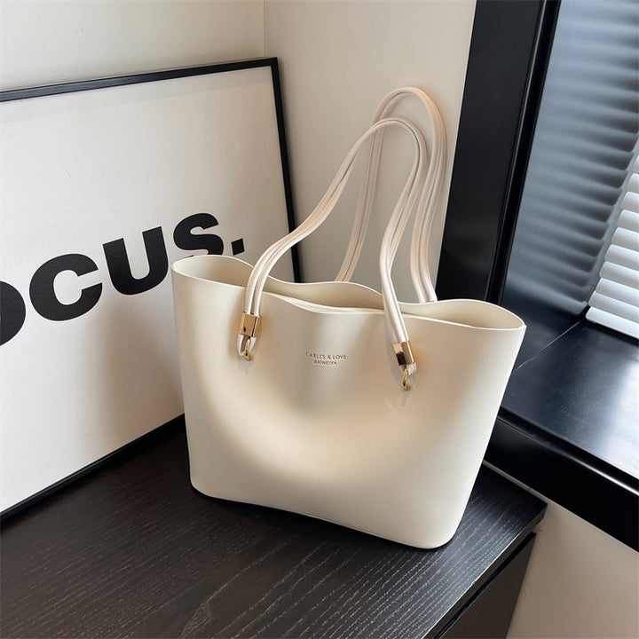 Tyylikäs ja ajaton käsilaukku – täydellinen arkeen ja juhlaan